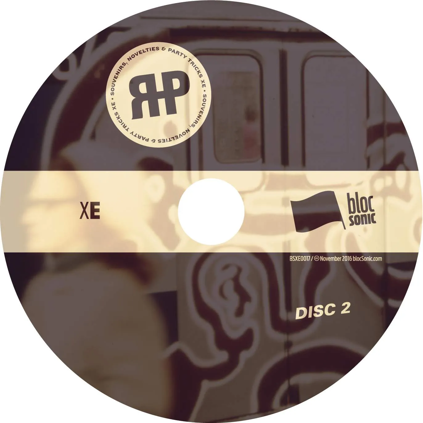 Album disc for “Souvenirs, Novelties &amp; Party Tricks XE” by Regenerated Headpiece